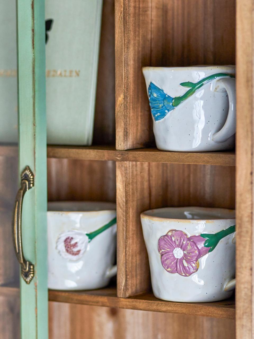 Loua mok met witte bloem