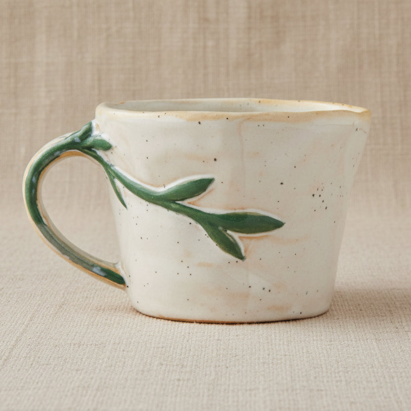 Loua mok met blauwe bloem