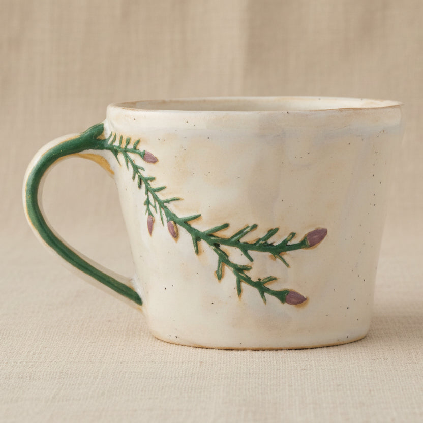 Loua mok met roze bloem