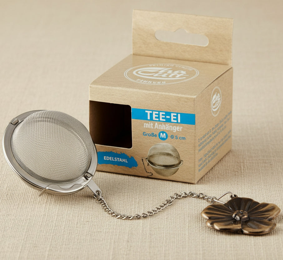 Image of Thee-Ei met bedeltje Bloem